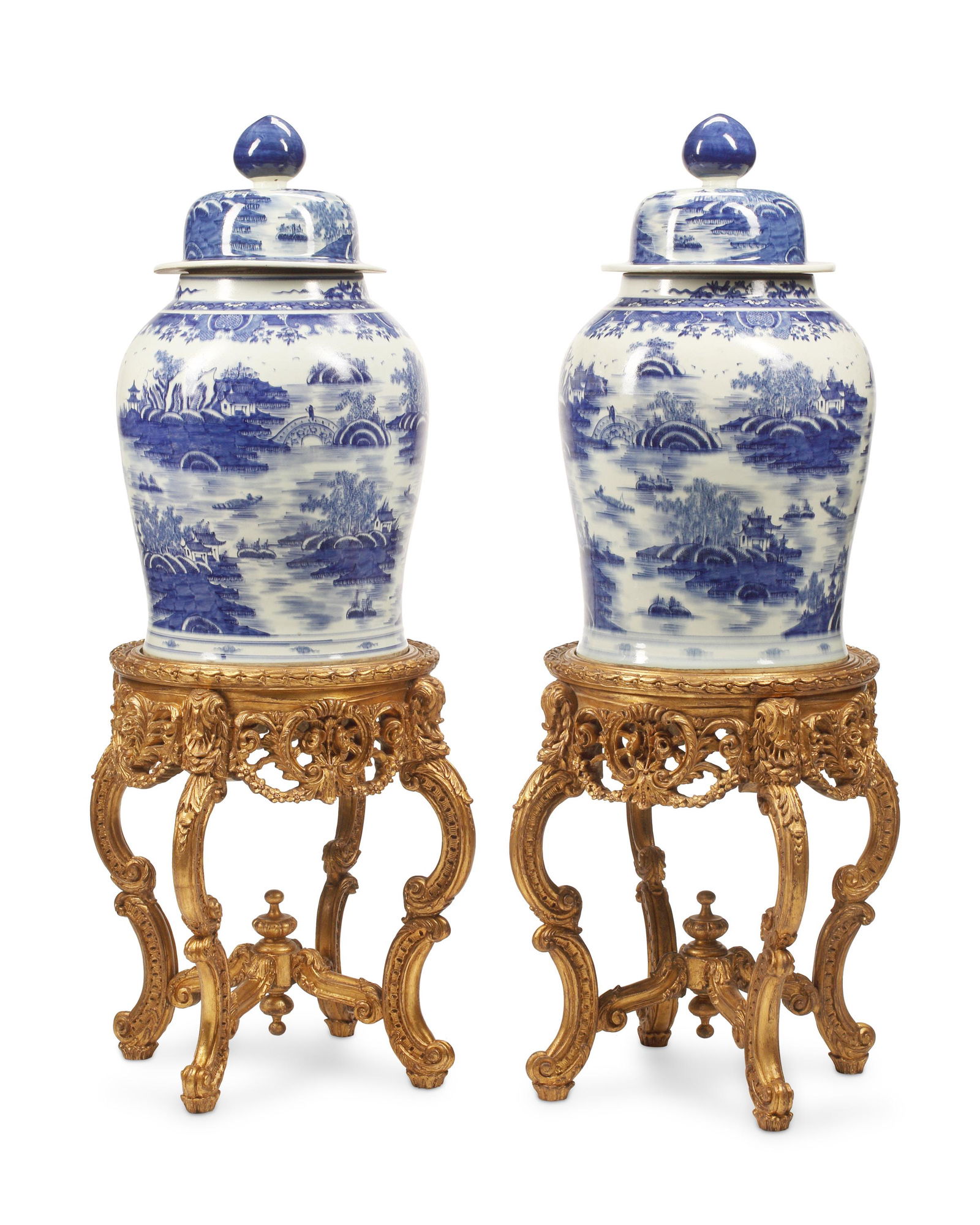 A pair of large Chinese temple jars: 20th century Each blue and white porcelain on carved giltwood bases with marble tops, 4 pieces Each overall: 63" H x 27" Dia.