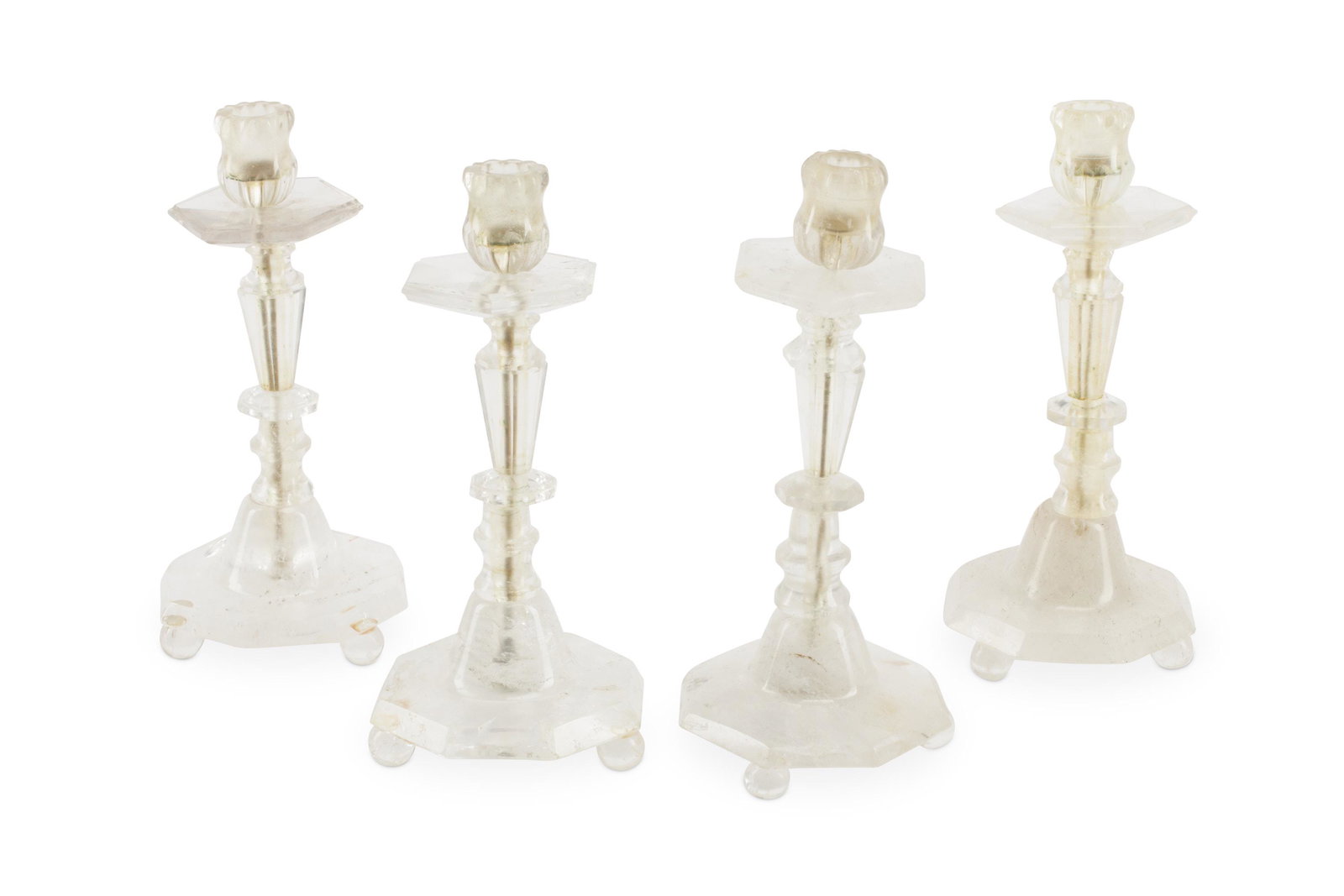 A set of Louis XVI-style rock crystal candlesticks: 20th century Each with knopped columns, 4 pieces Each: 10" H x 5" Dia.