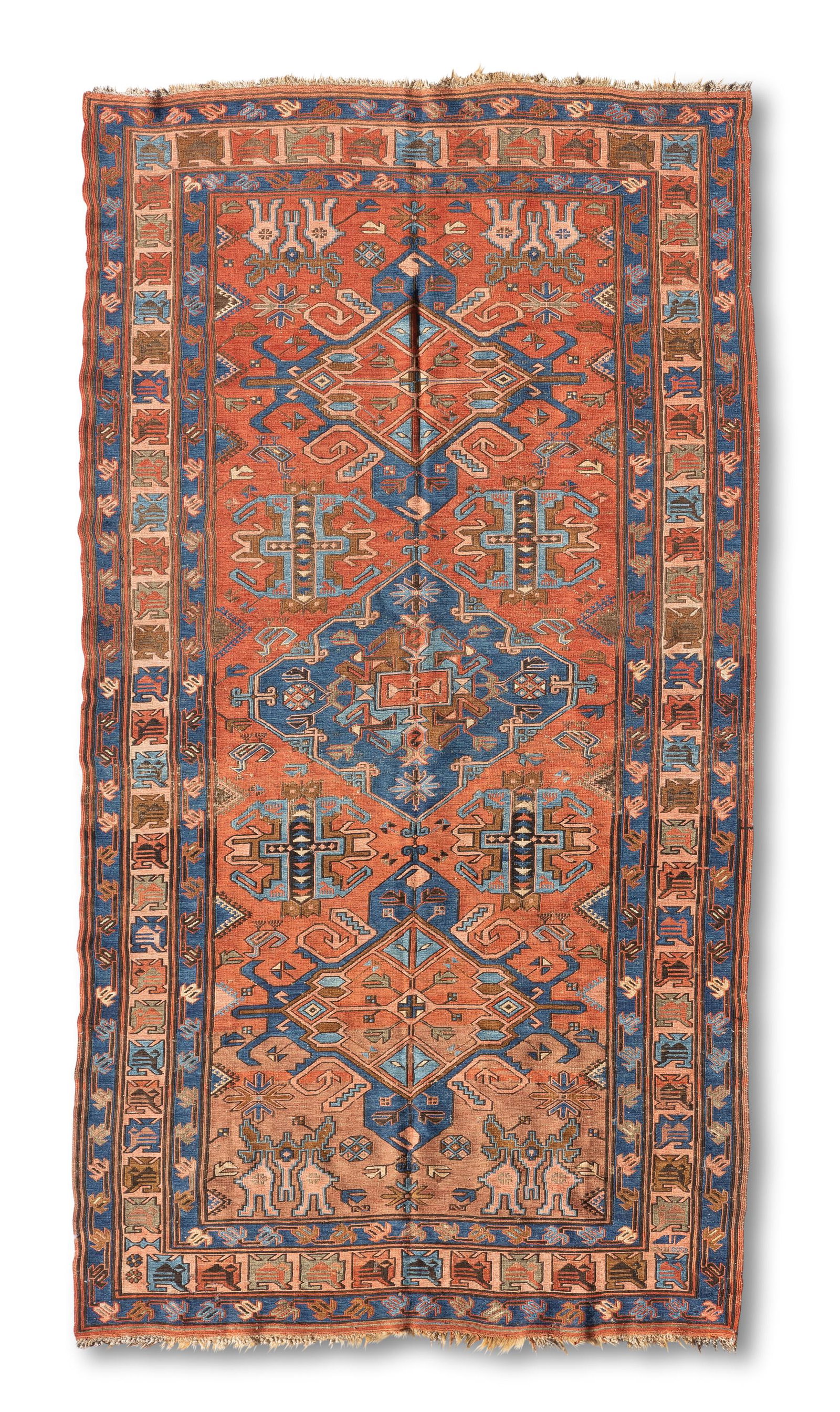 A Persian Soumak rug: Early 20th century; Iran Geometric designs; wool on wool foundation, flatweave 9'6" L x 4'10" W