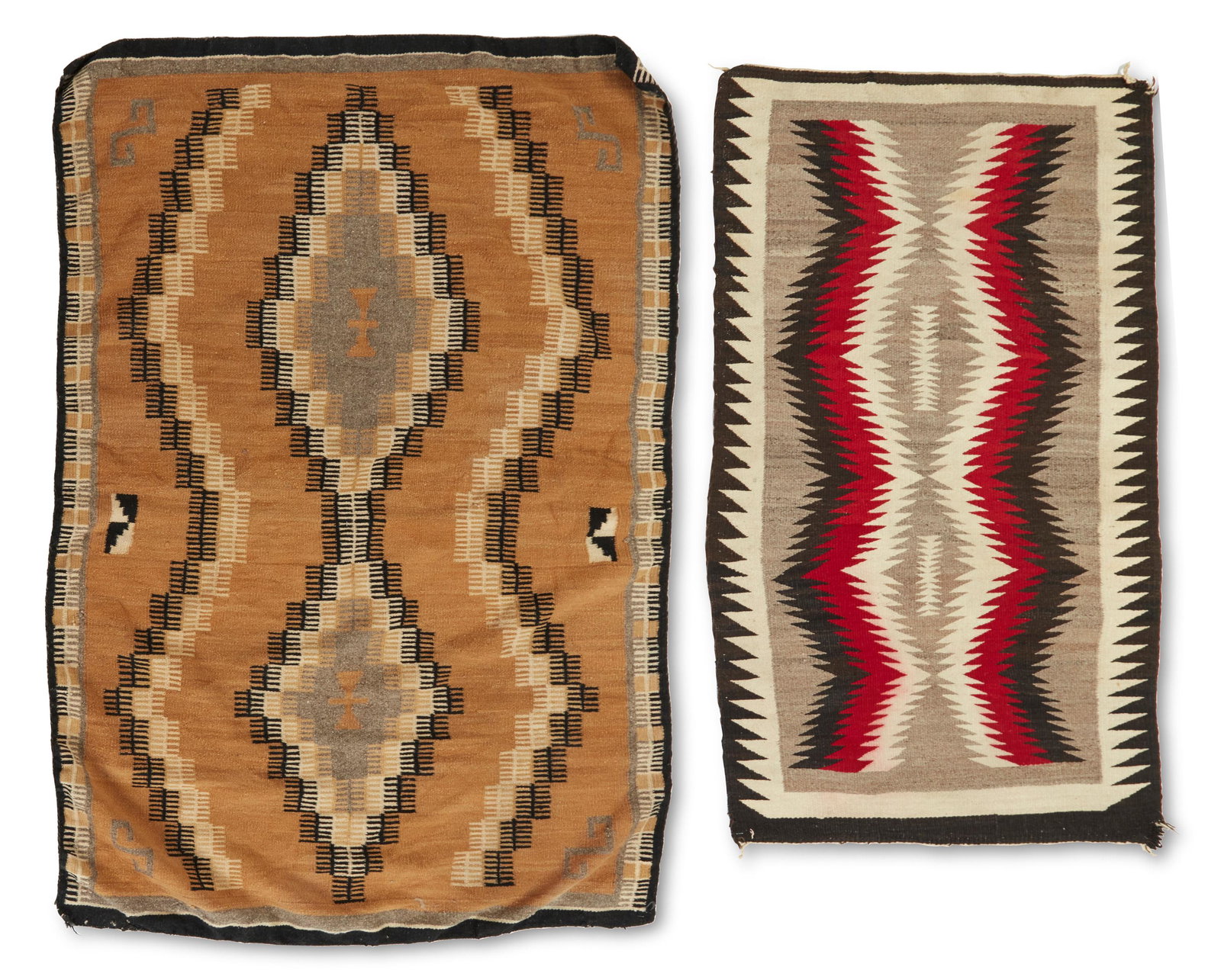Two Navajo regional rugs: Mid-20th century; Dine Comprised of a Navajo rug woven in mustard, black, cream, and grey wool with conjoined stepped diamonds and hatched borders (71" H x 46" W) and a Navajo rug woven in red, dark b