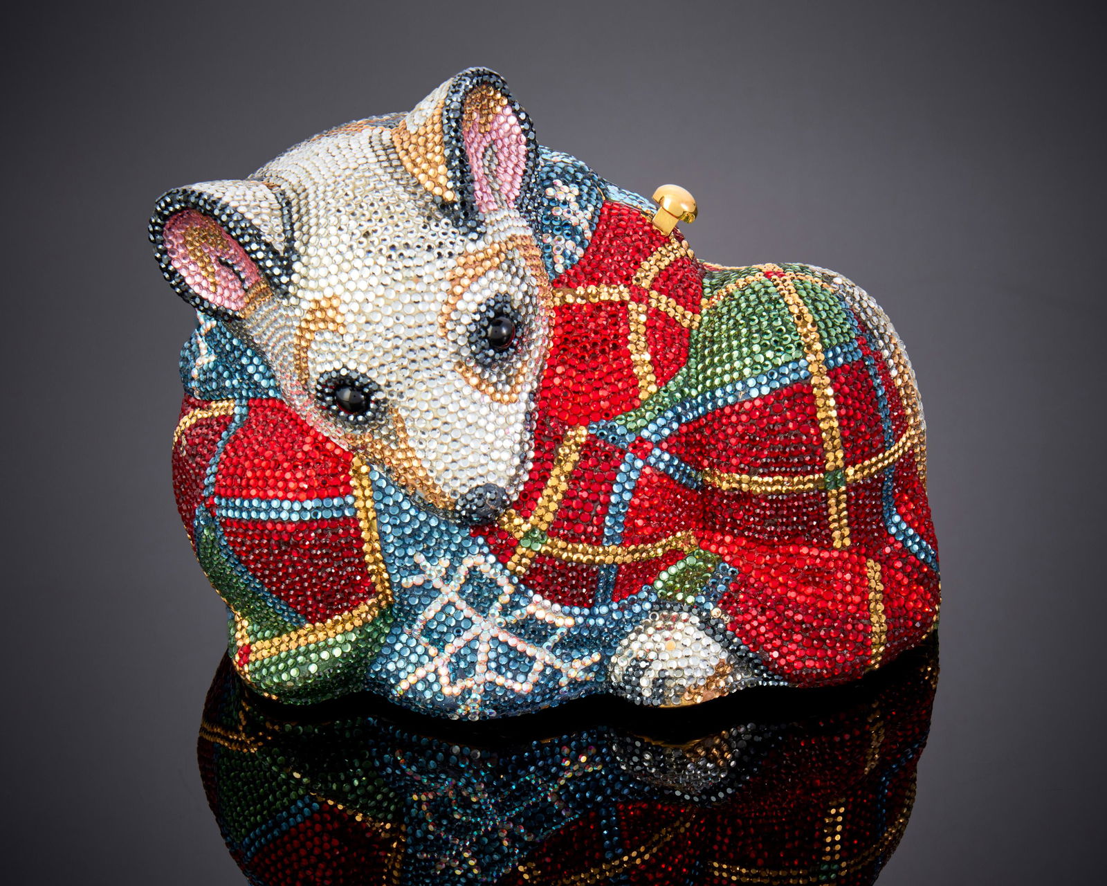 A Judith Leiber crystal Christmas mouse minaudiEre: A Judith Leiber crystal Christmas mouse minaudiEreLate 20th centuryMarked to interior plaque: Judith Leiber / New YorkA multicolored crystal-covered brass Christmas mouse purse with gold leather linin