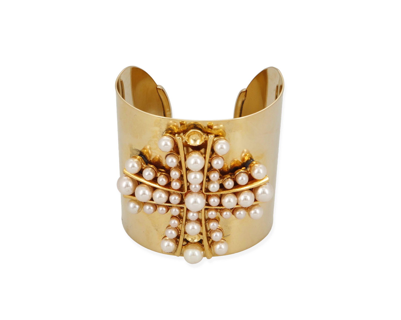 A Maltese cross cuff bracelet: A Maltese cross cuff bracelet Late 20th/21st century A gold-toned cuff with applied faux pearls in a central cross motif 6.5" total inner C x 2.5" H, with a 0.875" gap Provenance: Maria