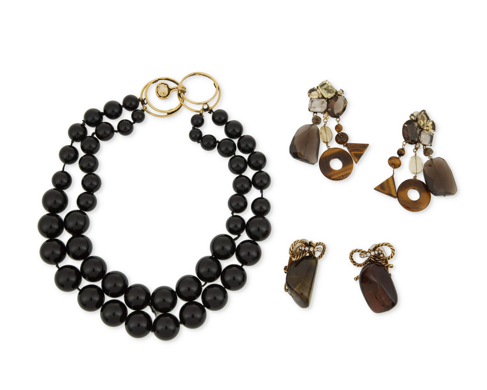 A group of Iradj Moini jewelry: A group of Iradj Moini jewelryLate 20th/21st centuryEach stamped: Iradj MoiniThree works including a double-strand graduated onyx bead necklace gauged from 10mm - 18mm in diameter with an 18k gold-pla