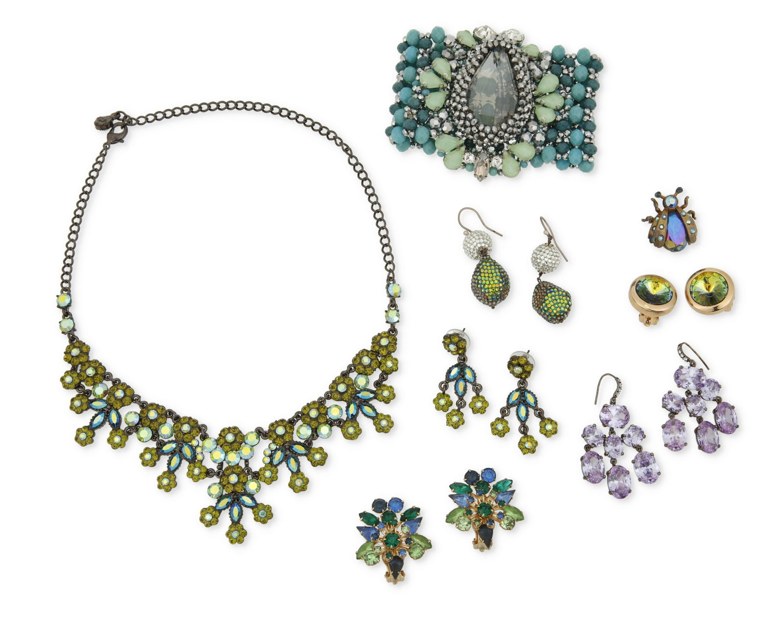 A group of costume jewelry: A group of costume jewelry Mid/late 20th/21st century Four marked for designer/maker A large group of eight works comprising a SNK floral bib necklace with iridescent green/blue rhinestones (19" 