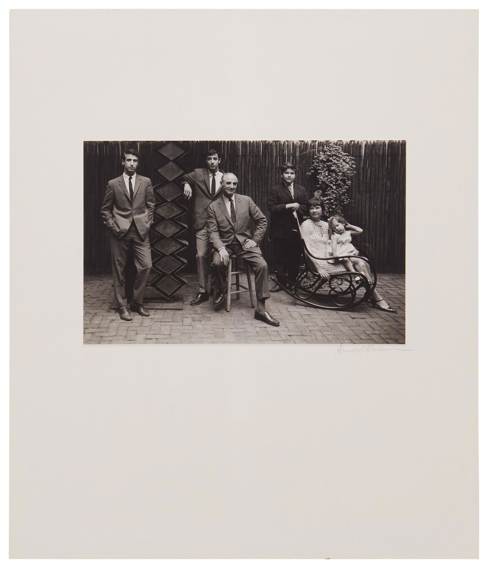 Arnold Newman, (1918-2006), Portrait of the Wise family, Gelatin silver print on photographic paper: Arnold Newman(1918-2006)Portrait of the Wise familyGelatin silver print on photographic paper laid to mat boardFrom the edition of unknown size and dateSigned in pencil on the mat board just below the