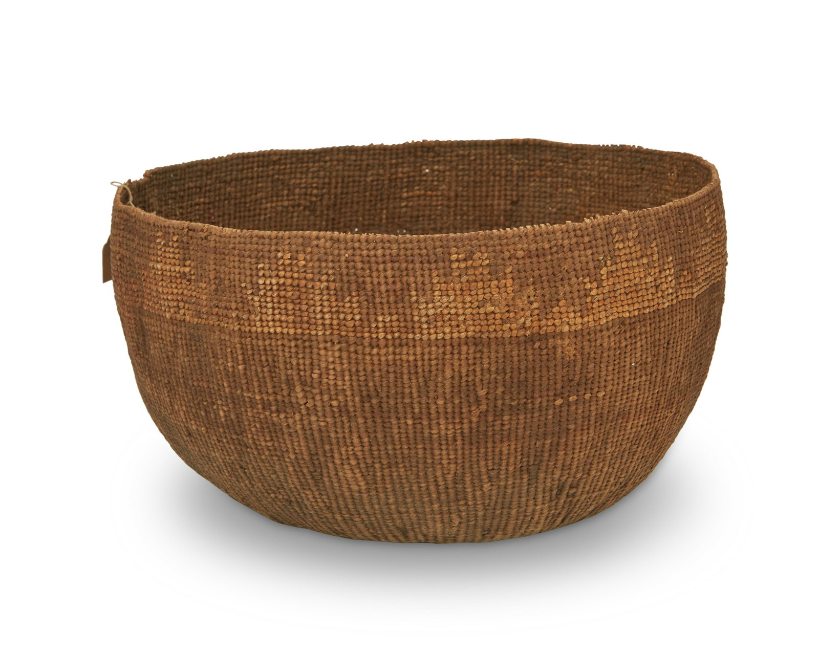 A Hupa/Yurok/Karuk mush bowl basket: A Hupa/Yurok/Karuk mush bowl basket Early 20th Century; Northern California A twined bowl with exterior motif and evidence of traditional use 6.5" H x 10" Dia. approximately