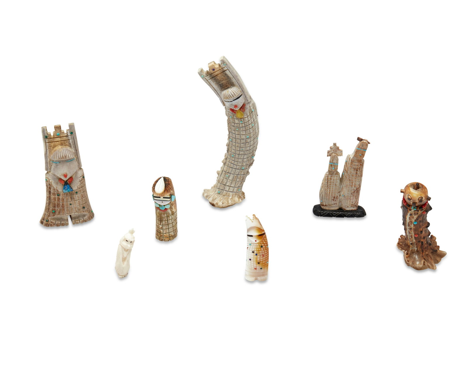 A group of Zuni carved fetish figures: A group of Zuni carved fetish figures Late 20th/21st century Five with signatures [one illegible]; two unmarked Seven carved fetish figures including a large Todd Poncho Zuni carved antler corn maiden