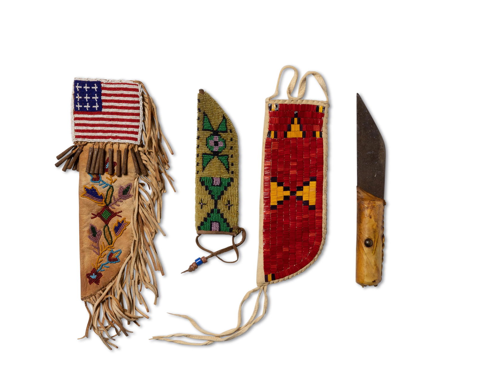 A group of Plains-style embellished hide knife sheaths (1 of 2)