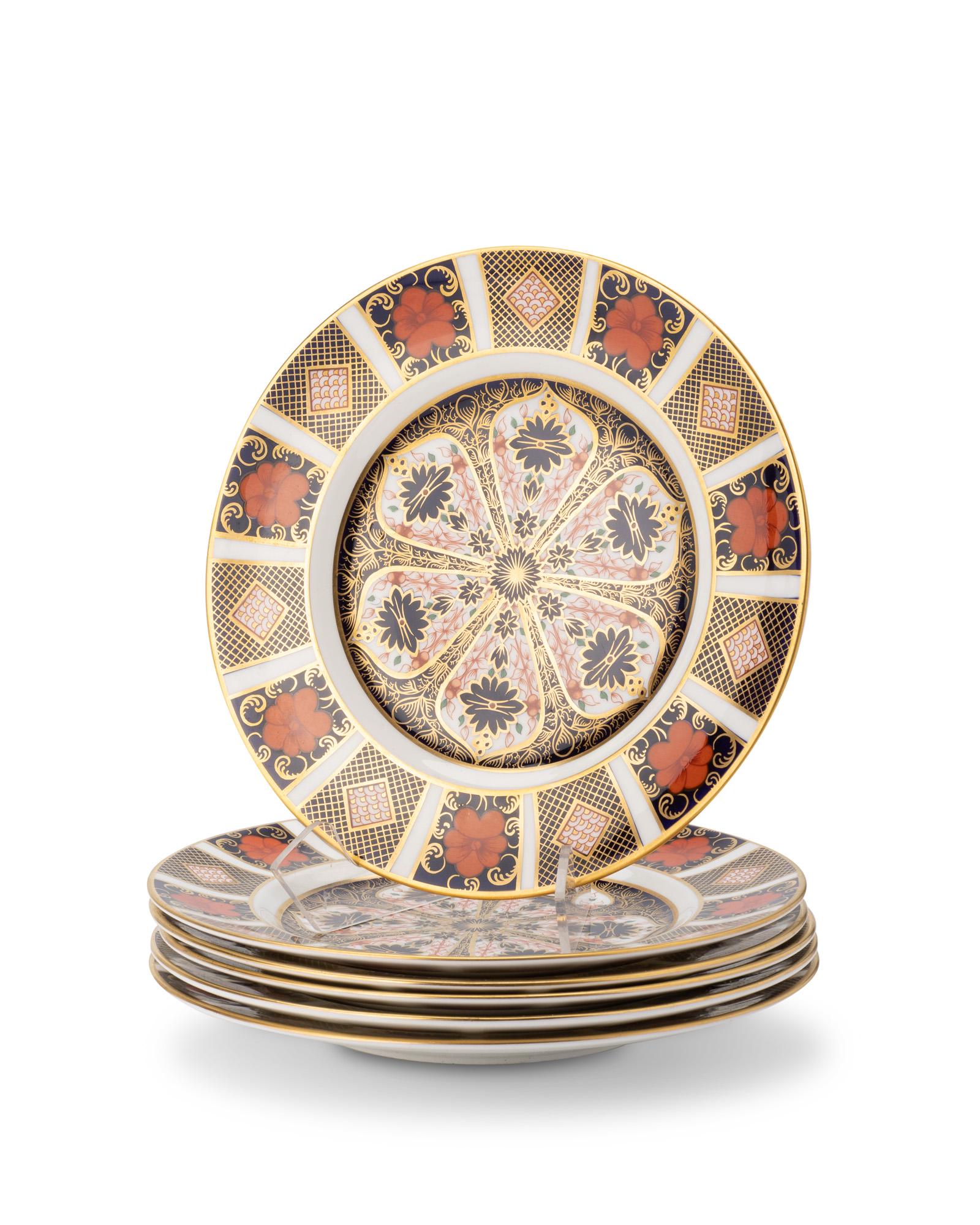 A set of Royal Crown Derby "Old Imari" salad plates: A set of Royal Crown Derby "Old Imari" salad plates 21st century Each marked for Royal Crown Derby; each further marked: English Bone China / 1128 / XXXVI Each plate with floral and geometri
