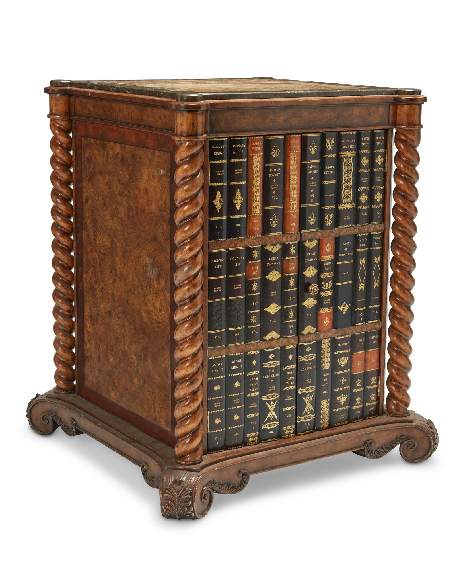 A Maitland-Smith faux book wine cabinet: A Maitland-Smith faux book wine cabinetLate 20th centuryWith two doors revealing a fitted interior flanked by serpentine columns and tessellated inlaid marble top36" H x 27.5" W x 28" D