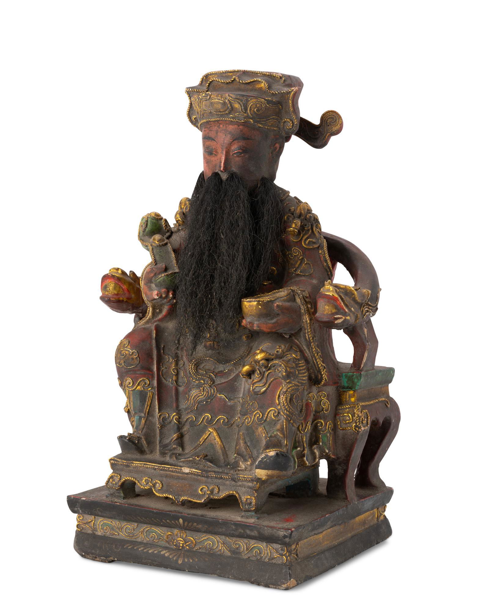 A Chinese carved wood "Guan Yu" figure (1 of 2)