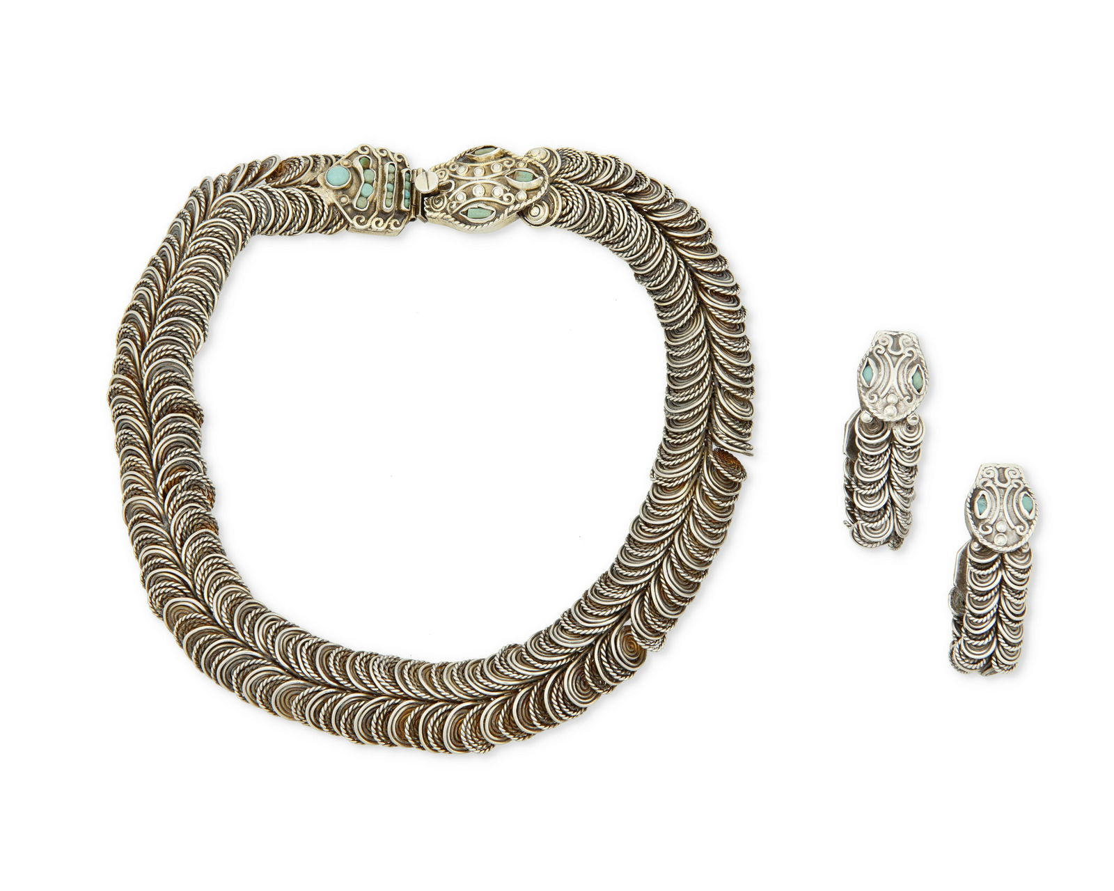 A set of Matl snake motif silver jewelry: A set of Matl snake motif silver jewelryMatilde Poulat and Ricardo Salas (d. 1960 and d.2006)Circa 1950-1960 and 1980--2006; Mexico City, MexicoNecklace etched: Matl / M. Reg / 142093 / Mexico / 925;