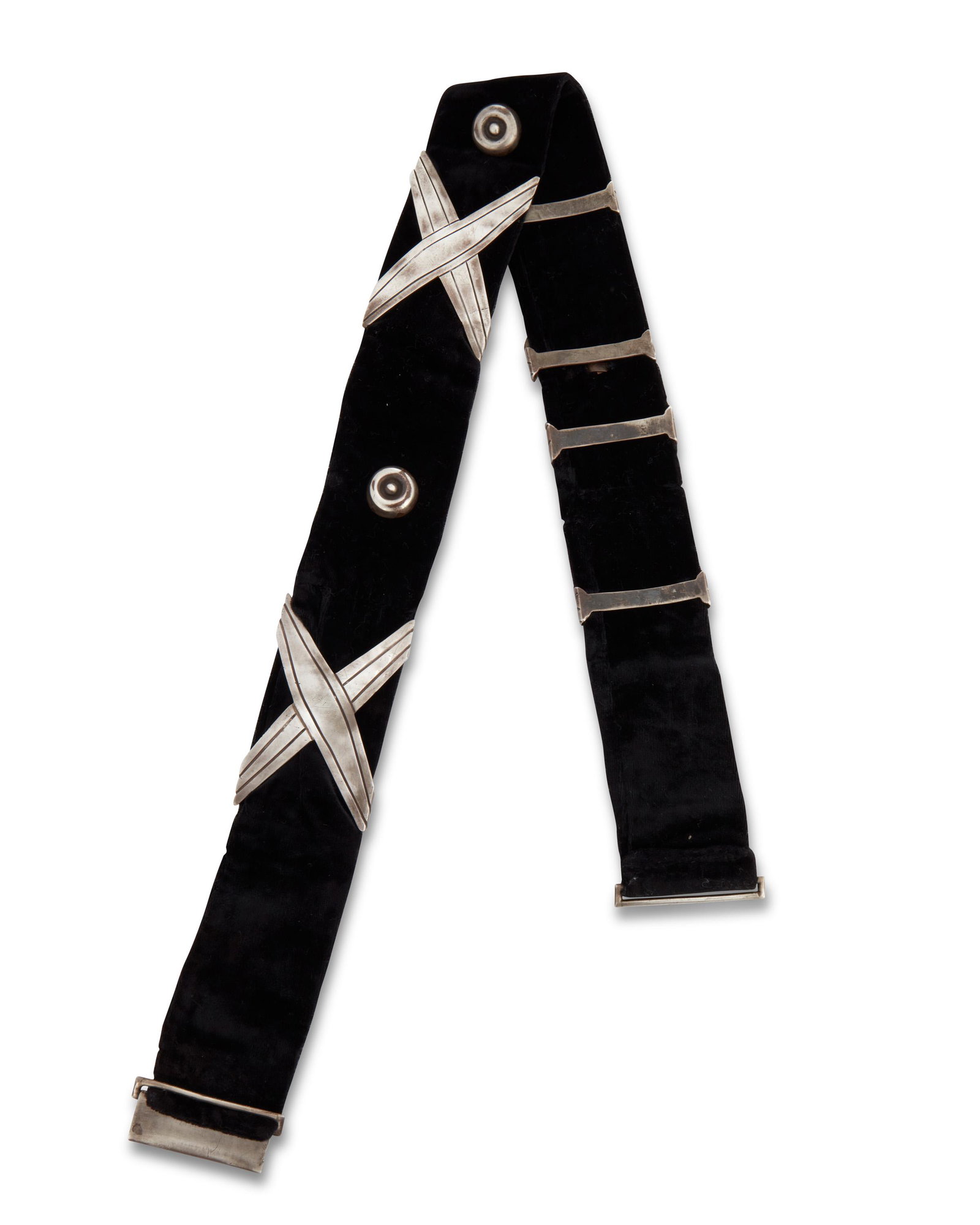 A Hector Aguilar silver concho belt: A Hector Aguilar silver concho belt Hector Aguilar (1905-1986) Circa 1940-1945; Taxco, Mexico Buckle stamped: HA / Taxco / 940 A Georgia O'Keefe-style belt, similar to one worn by Georgia O'Keefe in h