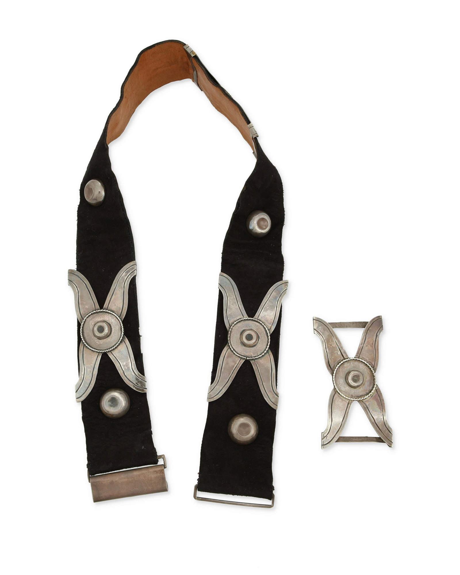 A Hector Aguilar silver concho belt: A Hector Aguilar silver concho belt Hector Aguilar (1905-1986) Circa 1940-1945; Taxco, Mexico Buckle stamped: HA [conjoined] / Taxco / 940 Comprising a sterling silver X-form concho belt with alternat