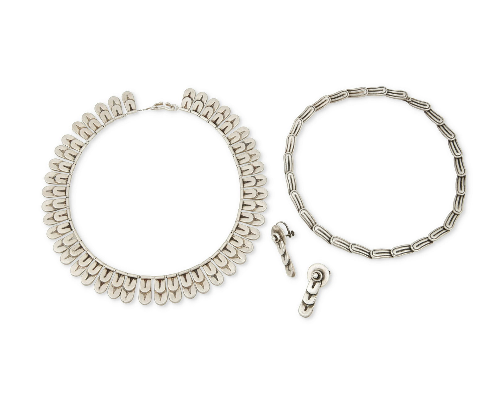 A group of Los Castillo silver jewelry: A group of Los Castillo silver jewelry Circa 1948-1970; Taxco, Mexico Each stamped: Los Castillo / Taxco / Made in Mexico / Sterling / [Design number]; one further stamped: [Eagle 15] Comprising a ste