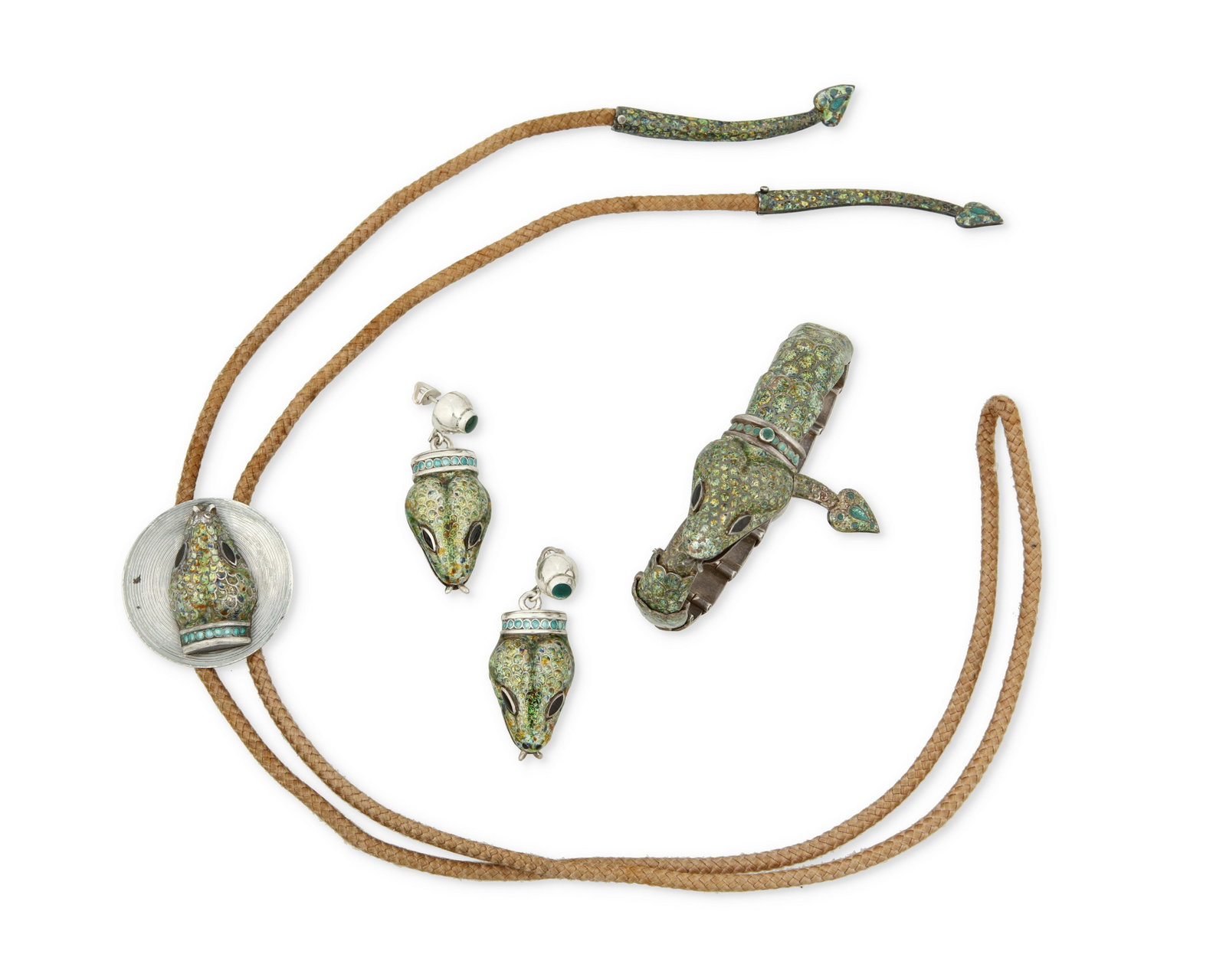 A group of Margot de Taxco "Serpent" silver and enamel jewelry: A group of Margot de Taxco "Serpent" silver and enamel jewelry Margot Van Voorhies (1896-1985) Circa 1955-1978; Taxco, Mexico Two stamped: Margot de Taxco / Sterling / Made in Mexico / Eagle
