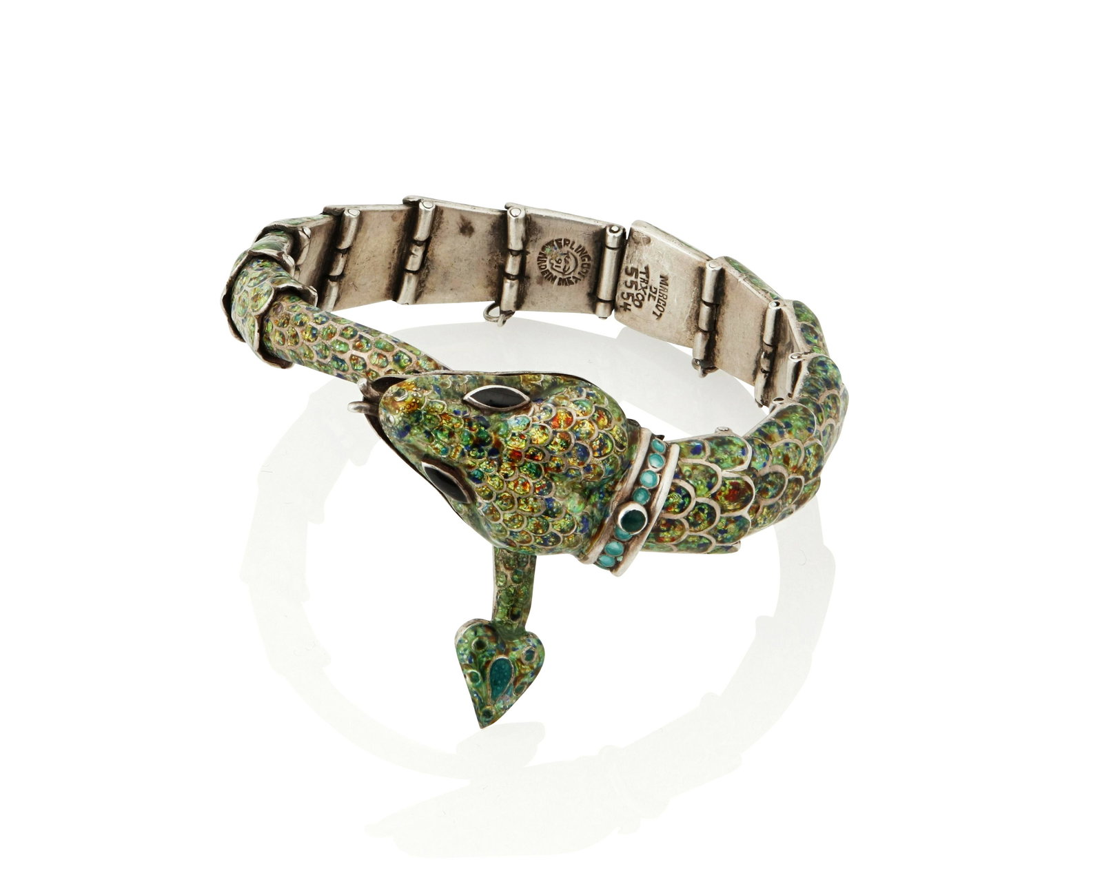 A Margot de Taxco "Serpent" silver and enamel bracelet: A Margot de Taxco "Serpent" silver and enamel bracelet Margot Van Voorhies (1896-1985) Circa 1955-1978; Taxco, Mexico Stamped: Margot de Taxco / Sterling / Made in Mexico / [Eagle 16] / 5554