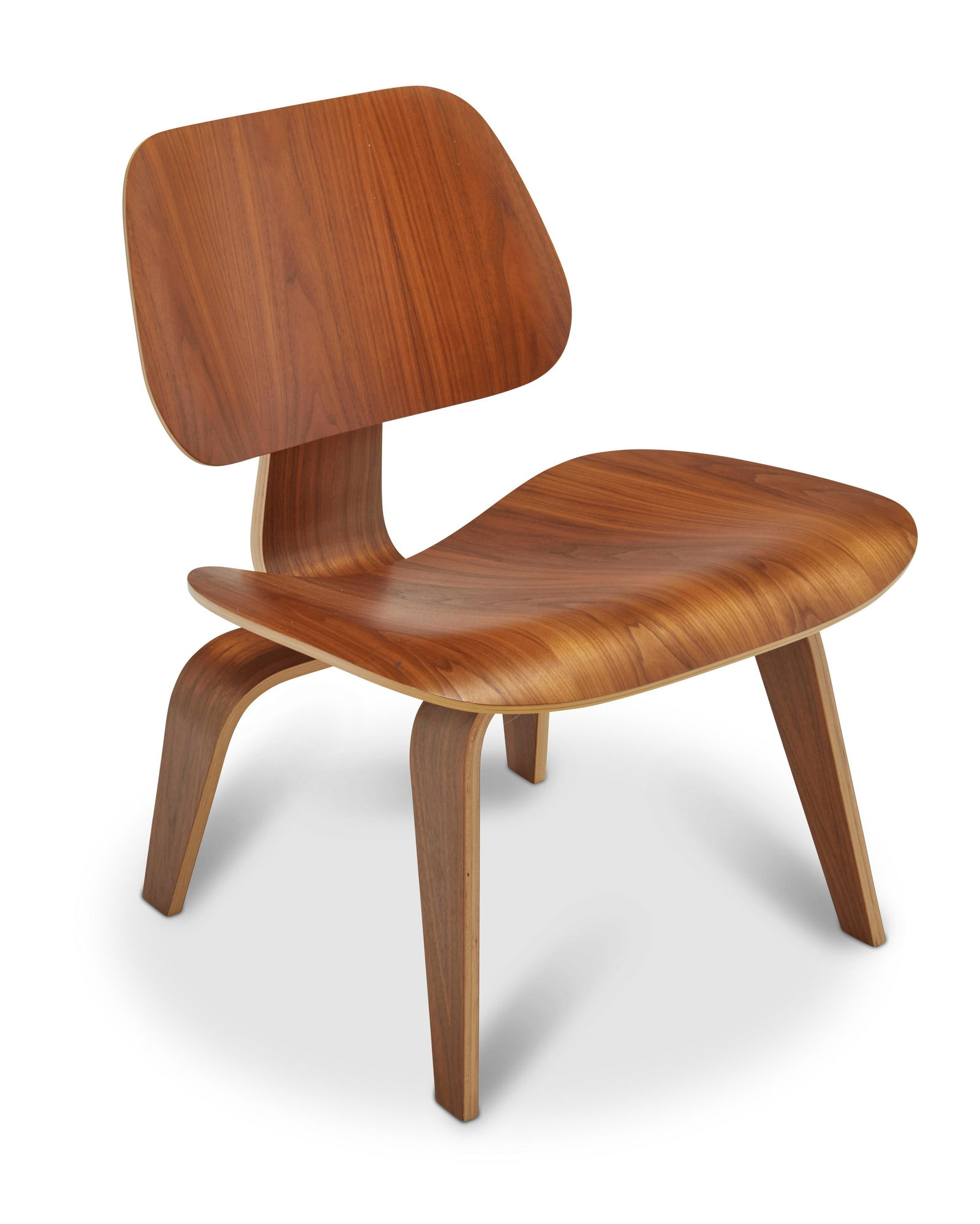 Ray and Charles Eames (1912-1988 and 1907-1978), LCW Molded Plywood Lounge Chair for Herman Miller,: Ray and Charles Eames (1912-1988 and 1907-1978)LCW Molded Plywood Lounge Chair for Herman Miller, late 20th centuryDesigned 1946Metal tag to the underside: Eames for Herman MillerMolded plywood body w