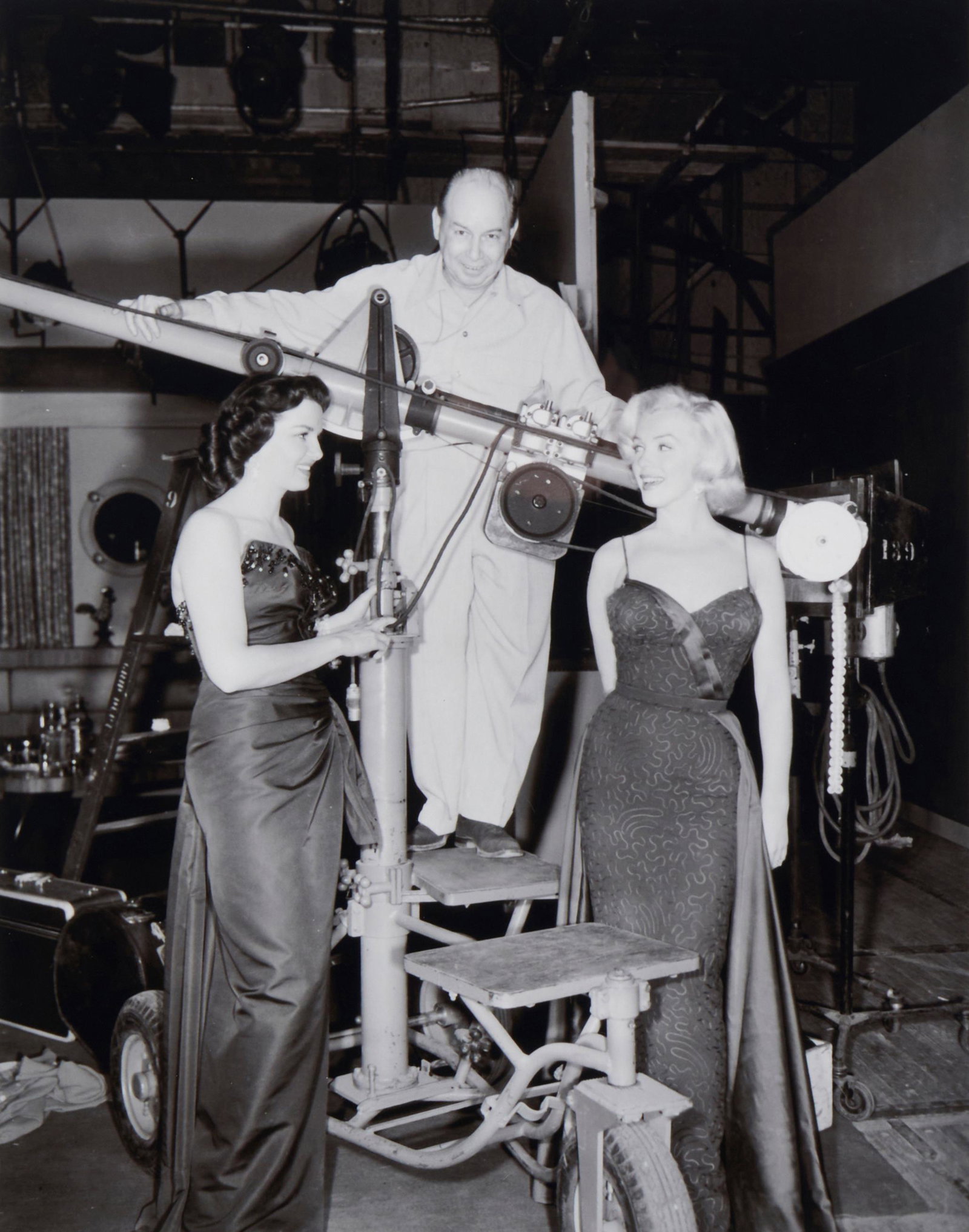20th Century American School, Behind the scenes of the film "Gentlemen Prefer Blondes," Photograph: 20th Century American School Behind the scenes of the film "Gentlemen Prefer Blondes" Photograph on paper Appears unsigned Sight: 13.75" H x 10.75" W Provenance: Property of 21st C
