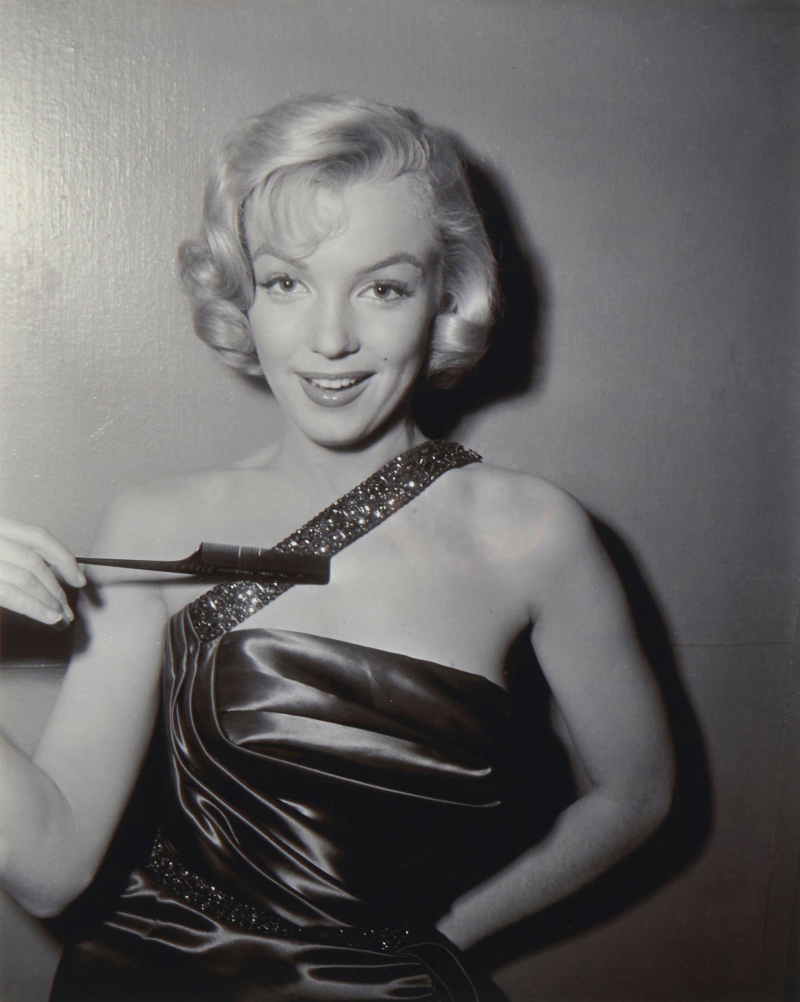 20th Century American School,Marilyn Monroe, Photograph on paper, Appears unsigned, Sight: 13.75" H: 20th Century American School Marilyn Monroe Photograph on paper From the edition of unknown size and date Appears unsigned Sight: 13.75" H x 10.75" W Provenance: Property of 21st Century Fox