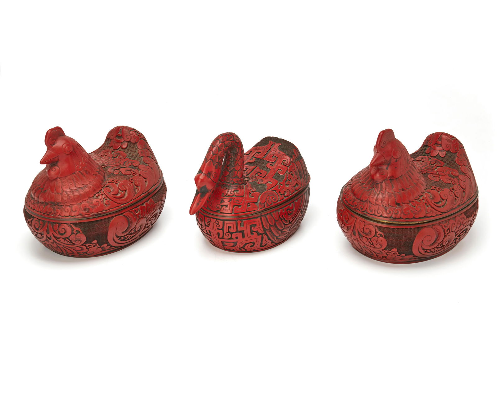 Three Chinese carved cinnabar avian boxes (1 of 5)