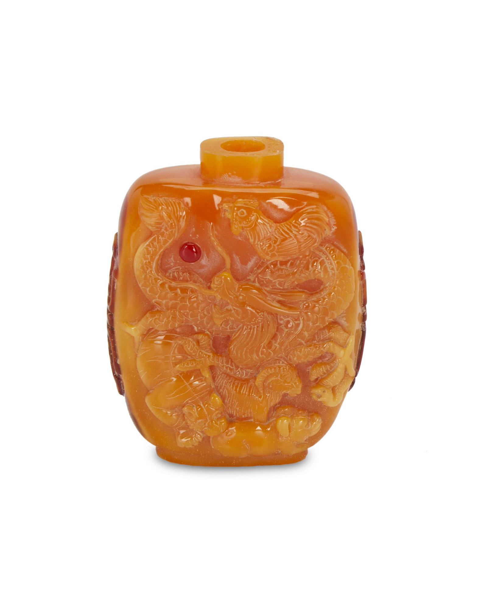 A Chinese carved hornbill snuff bottle: A Chinese carved hornbill snuff bottle 20th century With a dragon and various other animal and human figures 2.375" H x 1.875" W x 0.75" D