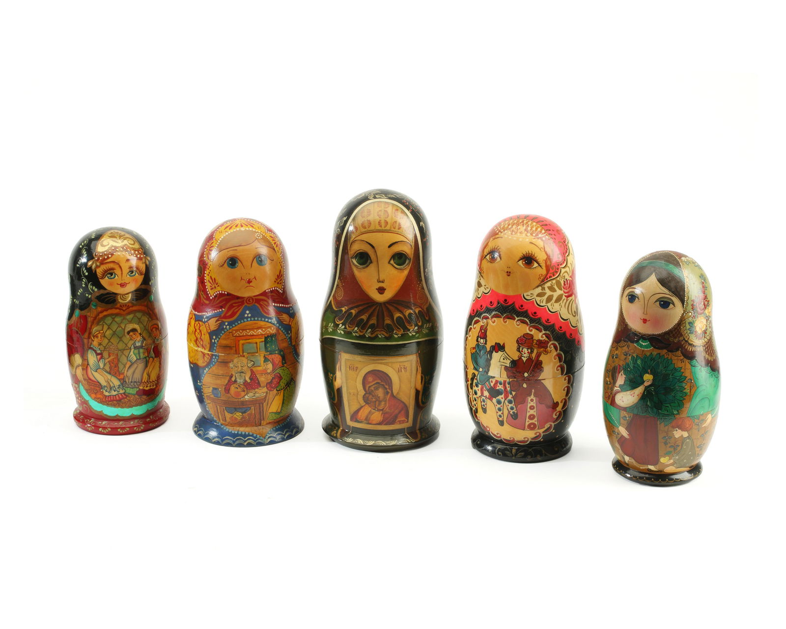 A group of Russian lacquered wood nesting dolls: A group of Russian lacquered wood nesting dollsLate 20th centurySeveral signed and dated for 1991; each with various other marksComprising five painted and lacquered wood Matryoshka doll sets, each wi