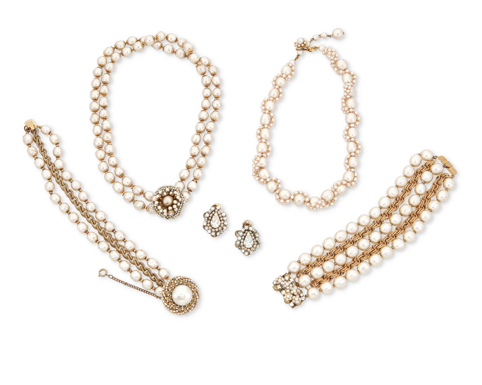 A group of Miriam Haskell jewelry: A group of Miriam Haskell jewelryMid-20th centuryFour marked: Miriam HaskellFive works comprising a single strand faux baroque pearl necklace with interlaced pearl beads (14.5"-16" L), a dou