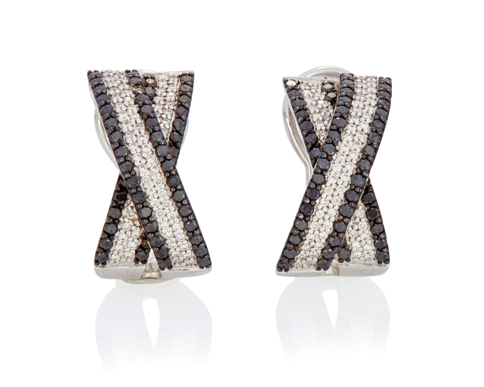 A pair of black and white diamond earrings: A pair of black and white diamond earrings14k white gold; Stamped: 14k / 585 / Crown logoDesign as a stylized "X" and set with a total of ninety-eight round full-cut black diamonds totaling