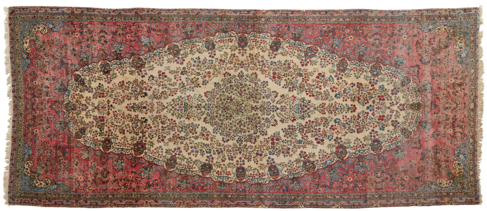 A Persian rug: A Persian rug Mid/late 20th century; Iran The wool on cotton rug with allover floral motif and central medallion 20'10" x 8'10"