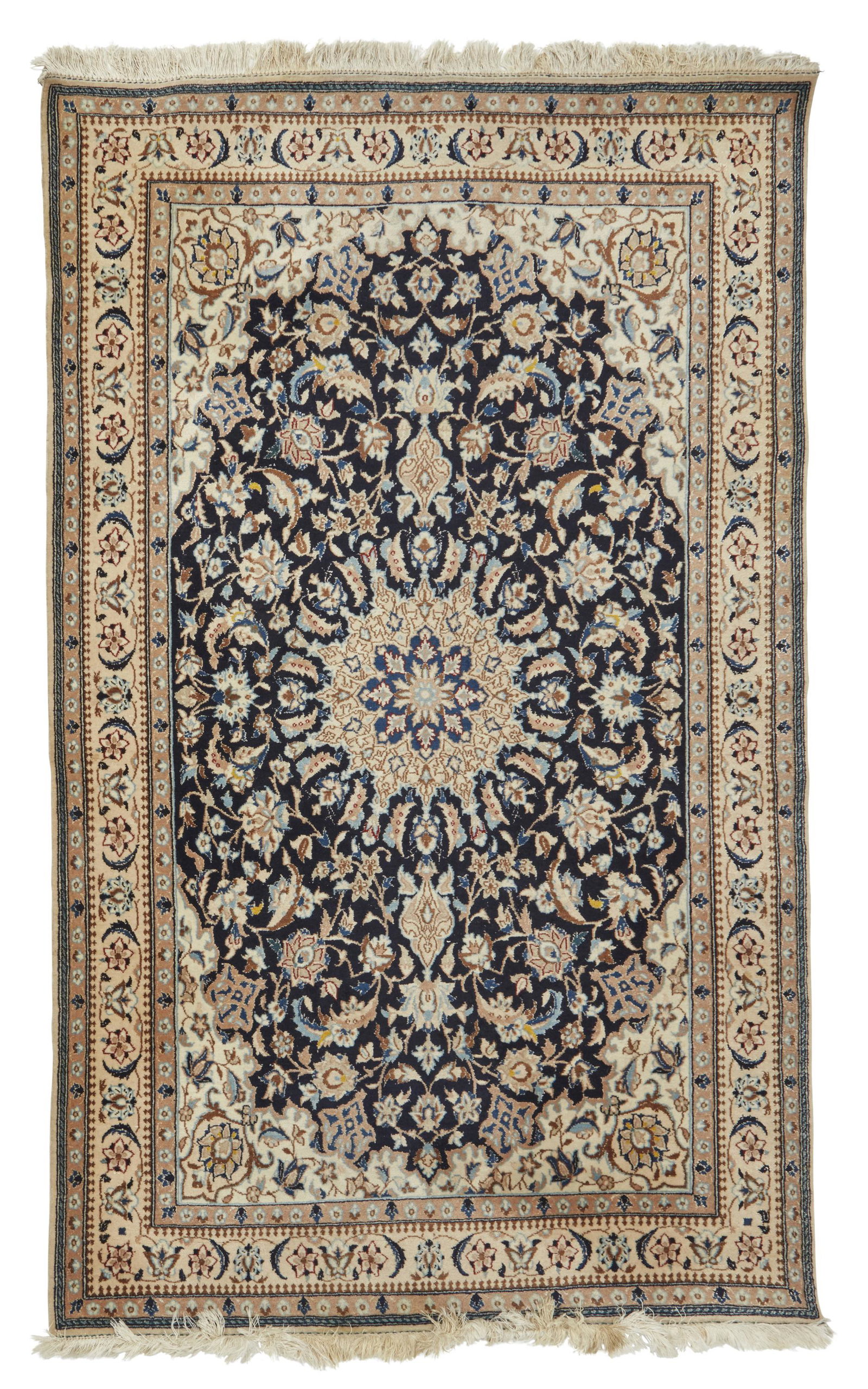 An Iranian area rug: An Iranian rug Late 20th century; Iran Wool on cotton foundation, with polychrome floral motifs centering a medallion in hues of cobalt blue and ivory 6' 5" L x 3' 9" W