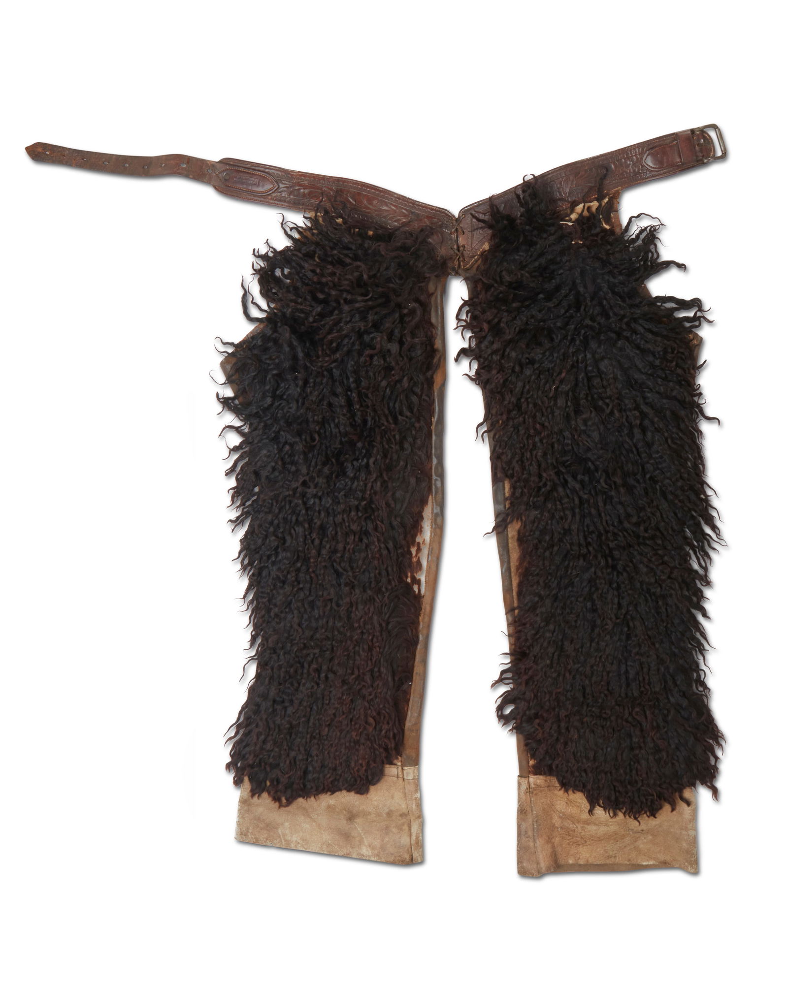 A pair of Al Furstnow "wooly chaps": A pair of Al Furstnow "wooly chaps"Al Furstnow (1862-1925)A pair of leather and hair-on-hide black sheep/goatskin curly wool "woolies," late 19th/early 20th centuryStamped to belt: