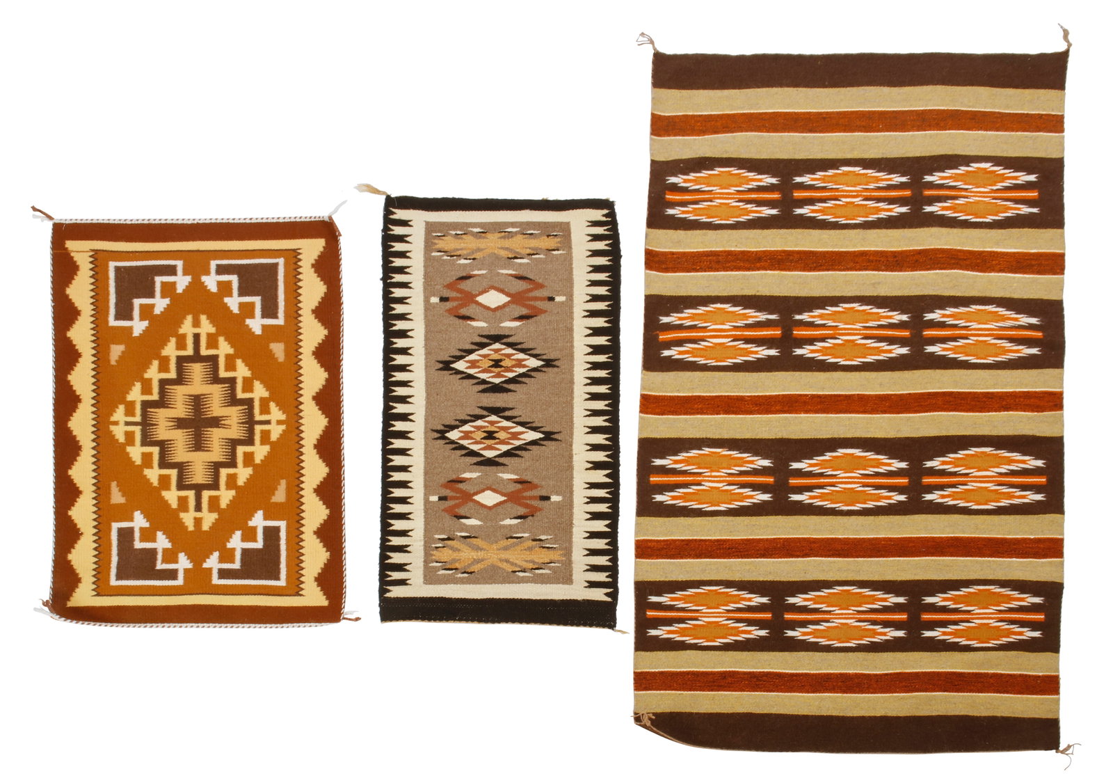 Three Navajo textiles: Three Navajo textiles Mid/late 20th century, DinE Comprising three weavings in gold, orange, brown, black, cream, and tan wool in various styles and designs including a small regional mat with central