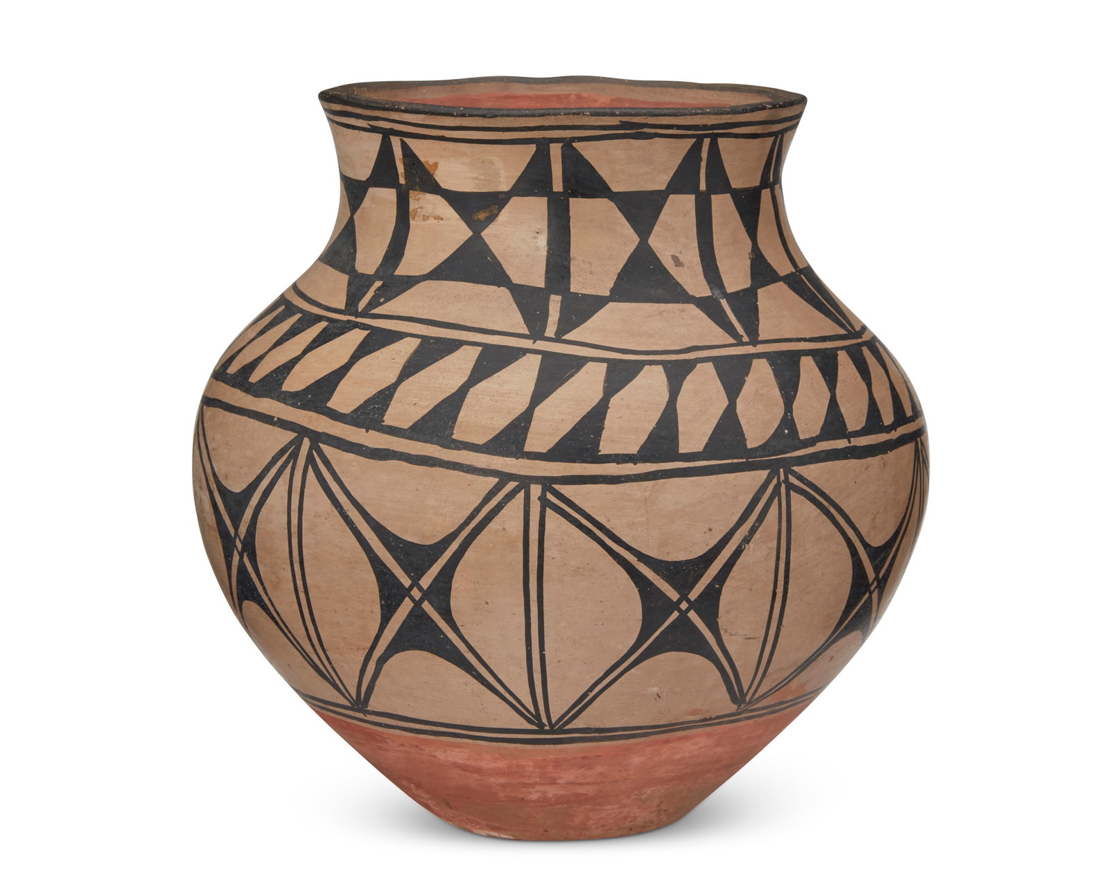 A Santo Domingo Puebloan olla jar: A Santo Domingo Pueblo olla jar Early 20th century Unmarked, attributed to the Aguilar (CatE) sisters by repute The black and grey jar with banded geometric motifs 9" H x 9.5" Dia. Provenanc