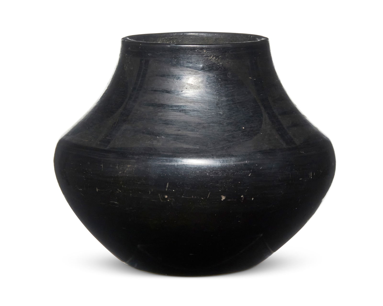 Maximiliana iAnnai Montoya Martinez (1885-1955, San Ildefonso Pueblo): Maximiliana iAnnai Montoya Martinez (1885-1955, San Ildefonso Pueblo)A San Ildefonso blackware pottery jar, circa 1930Incised to underside: annaThe jar with geometric feather design to shoulder6.75&qu