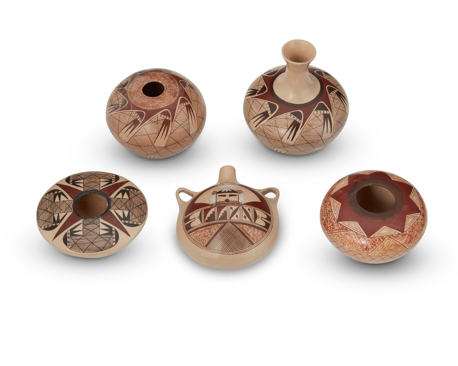 Nona Naha (1958-2021, Hopi-Tewa Pueblo): Nona Naha (1958-2021, Hopi-Tewa Pueblo) Five Hopi pottery vessels, late 20th/early 21st century Each signed: Nona Naha [corn cipher] The slip glazed vessels comprising three seed pots and a vase, each
