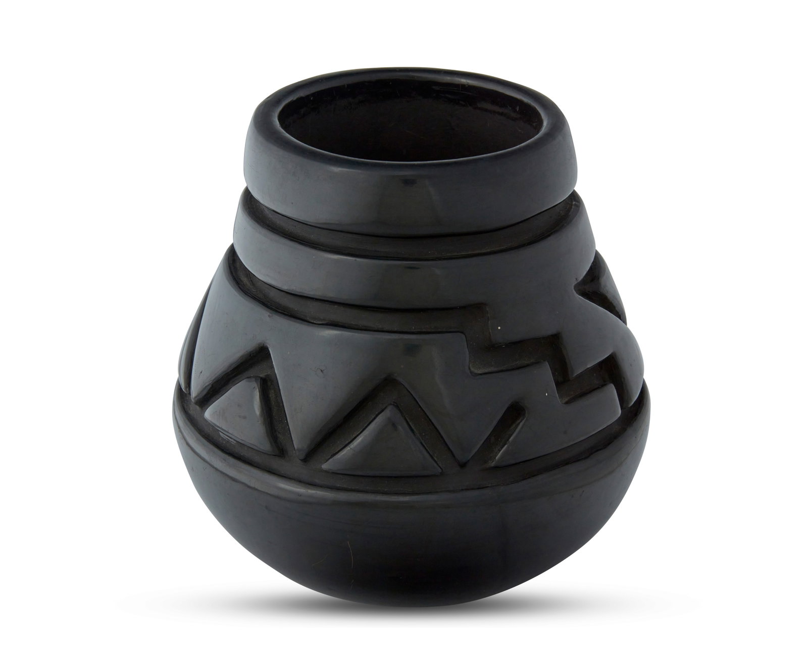 Margaret Tafoya (1904-2001, Santa Clara Pueblo): Margaret Tafoya (1904-2001, Santa Clara Pueblo) A Santa Clara blackware pottery jar, mid/late 20th century Incised to underside: Margaret Tafoya / Santa Clara Pueblo / N. Mex The tapered jar with deep