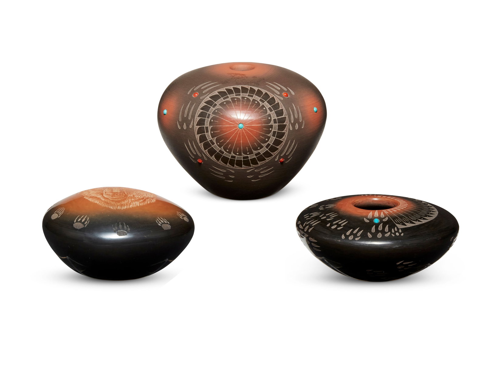 Three Santa Clara Pueblo pottery vessels: Three Santa Clara Pueblo pottery vessels Three works: Ron Suazo (b. 1954, Santa Clara Pueblo) Two blackware pottery vessels, late 20th/early 21st century Each signed: Ron Suazo / Santa Clara Pueblo, N
