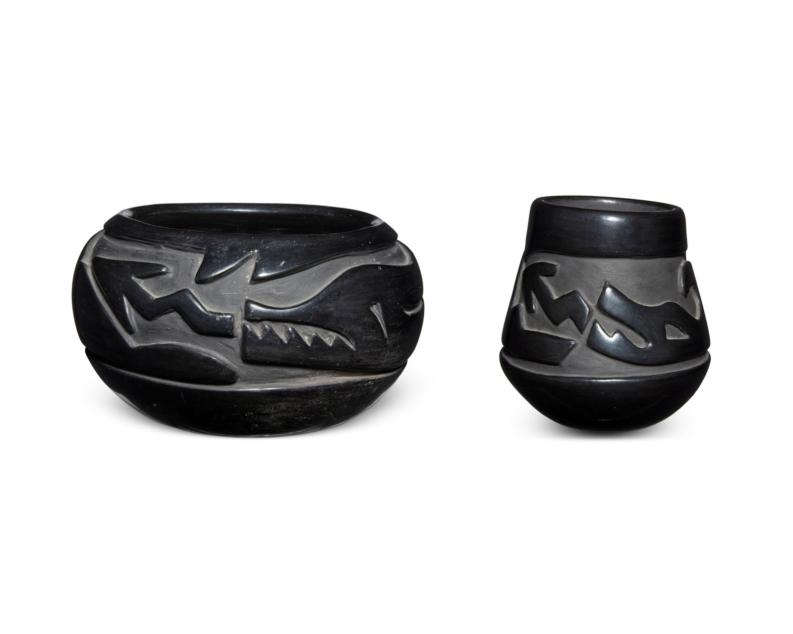 Two Santa Clara Pueblo blackware pottery vessels: Two Santa Clara Pueblo blackware pottery vessels Two works: Teresita Naranjo (1919-1999, Santa Clara Pueblo) A blackware pottery bowl, mid/late 20th century Incised to underside: Teresita Naranjo / Sa