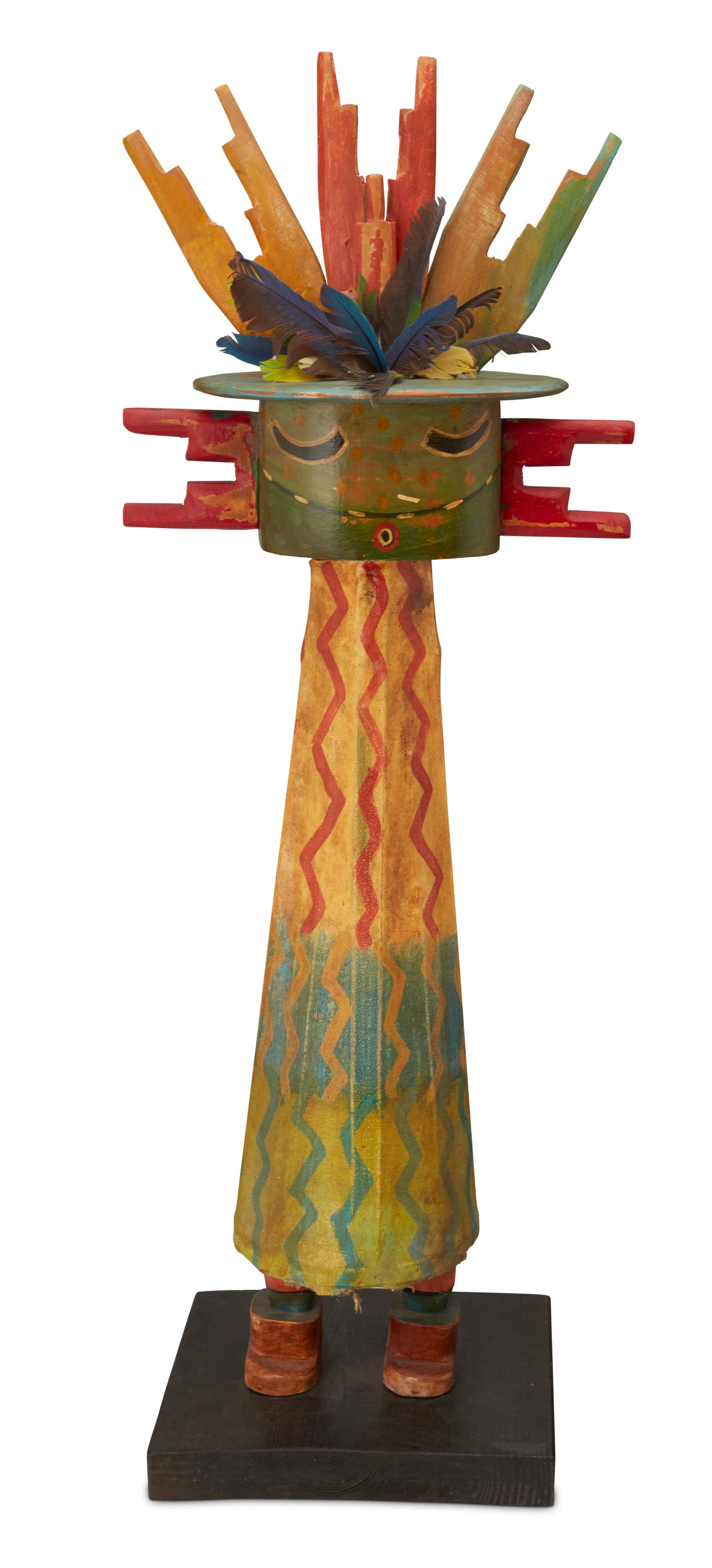 Gregory Lomayesva (b. 1971): Gregory Lomayesva (b. 1971) A standing kachina figure sculpture, 1994 Signed to upper body verso: Gregory Lomayesva / 94 [faint] A tall figure with painted wood mask and tableta with multicolored feat