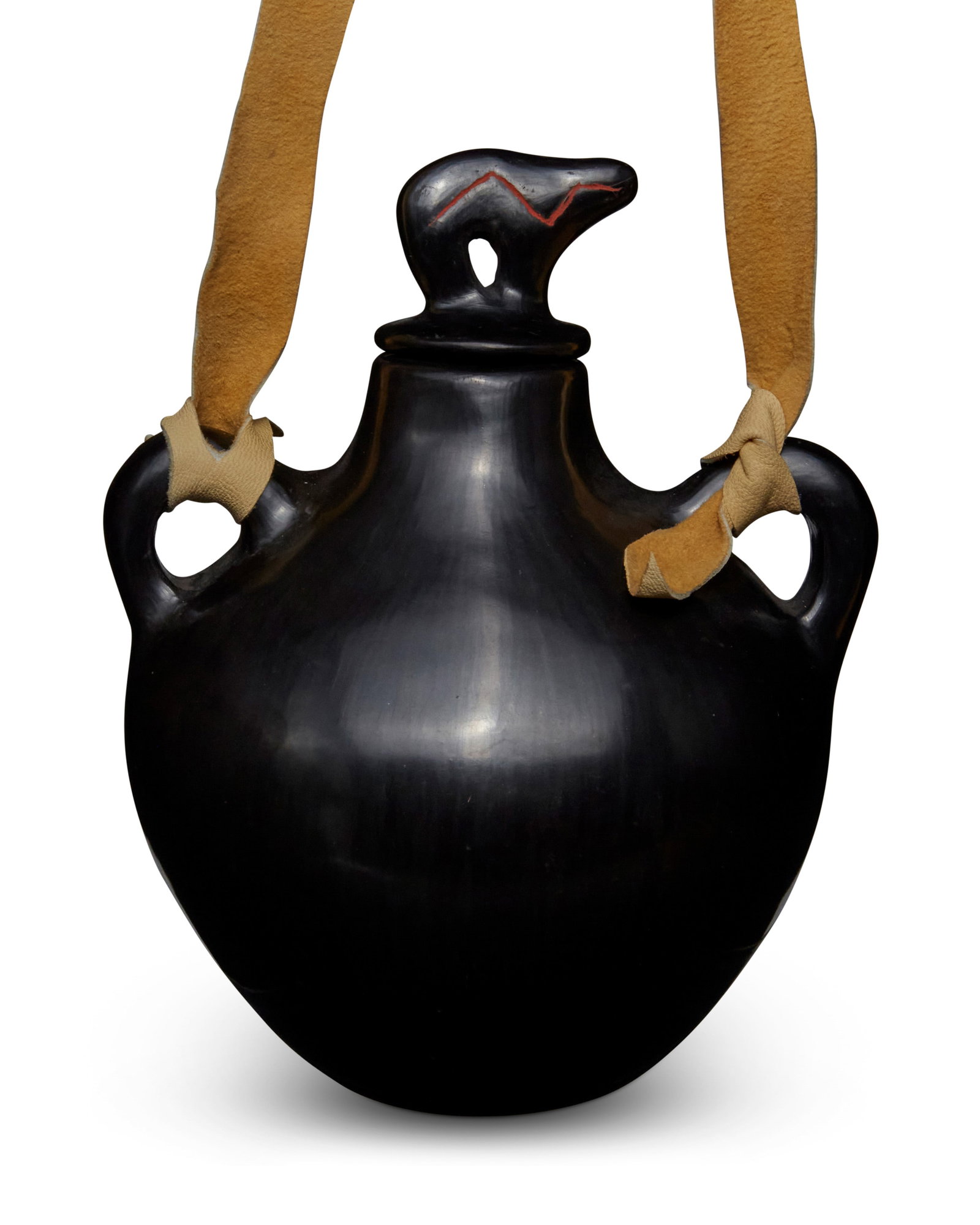 Martha Mirabal (b. 1946, Santa Clara Pueblo): Martha Mirabal (b. 1946, Santa Clara Pueblo) A Santa Clara lidded blackware canteen, late 20th century Signed to base: Martha Mirabal A small globular upright canteen with heartline bear stopper lid a