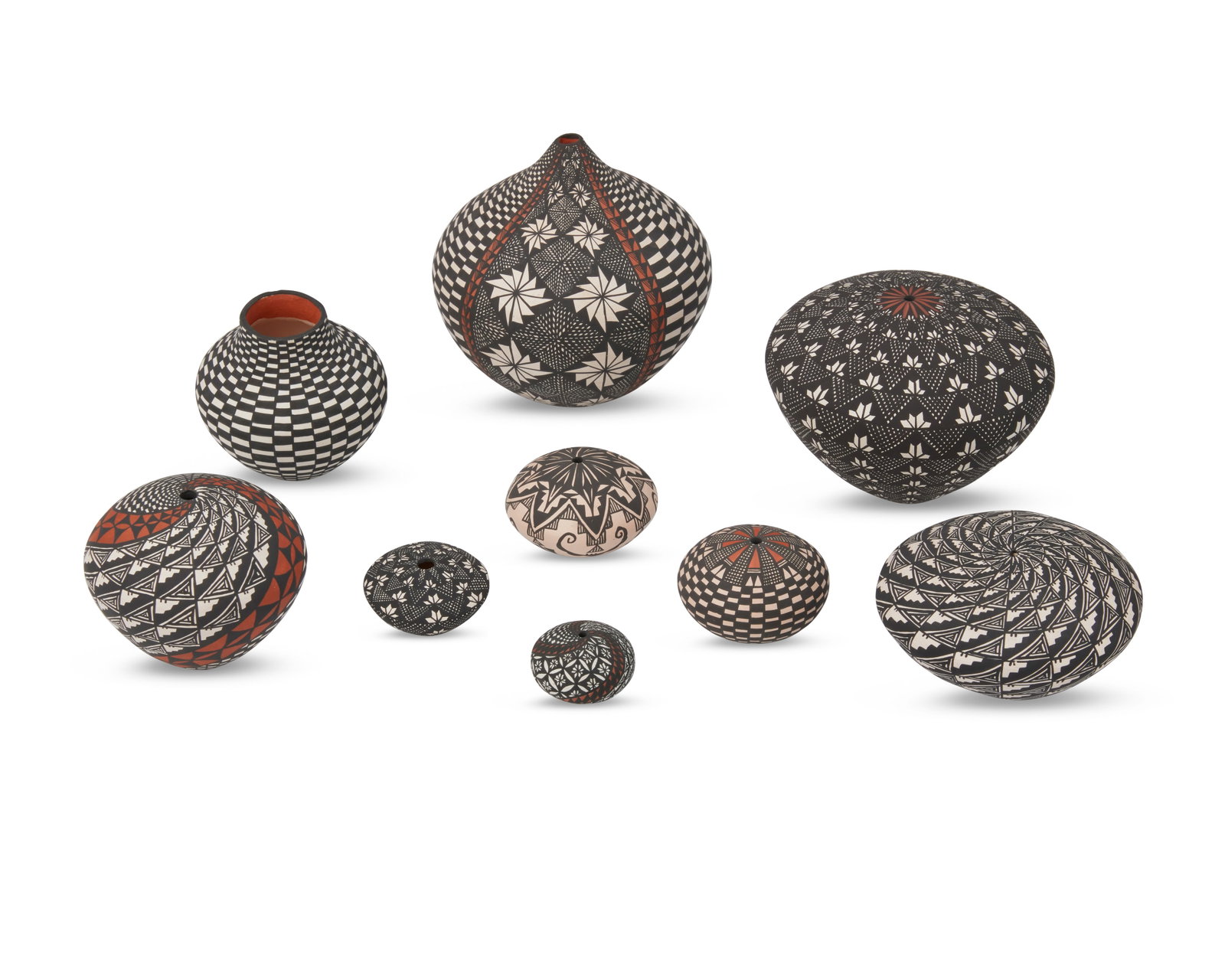 Sandra Victorino (b. 1958, Acoma Pueblo): Sandra Victorino (b. 1958, Acoma Pueblo) A group of small Acoma seed pots and a jar, late 20th/early 21st century Five signed: Sandra Victorino / Acoma NM; three signed: Sandra Victorino; one signed: 