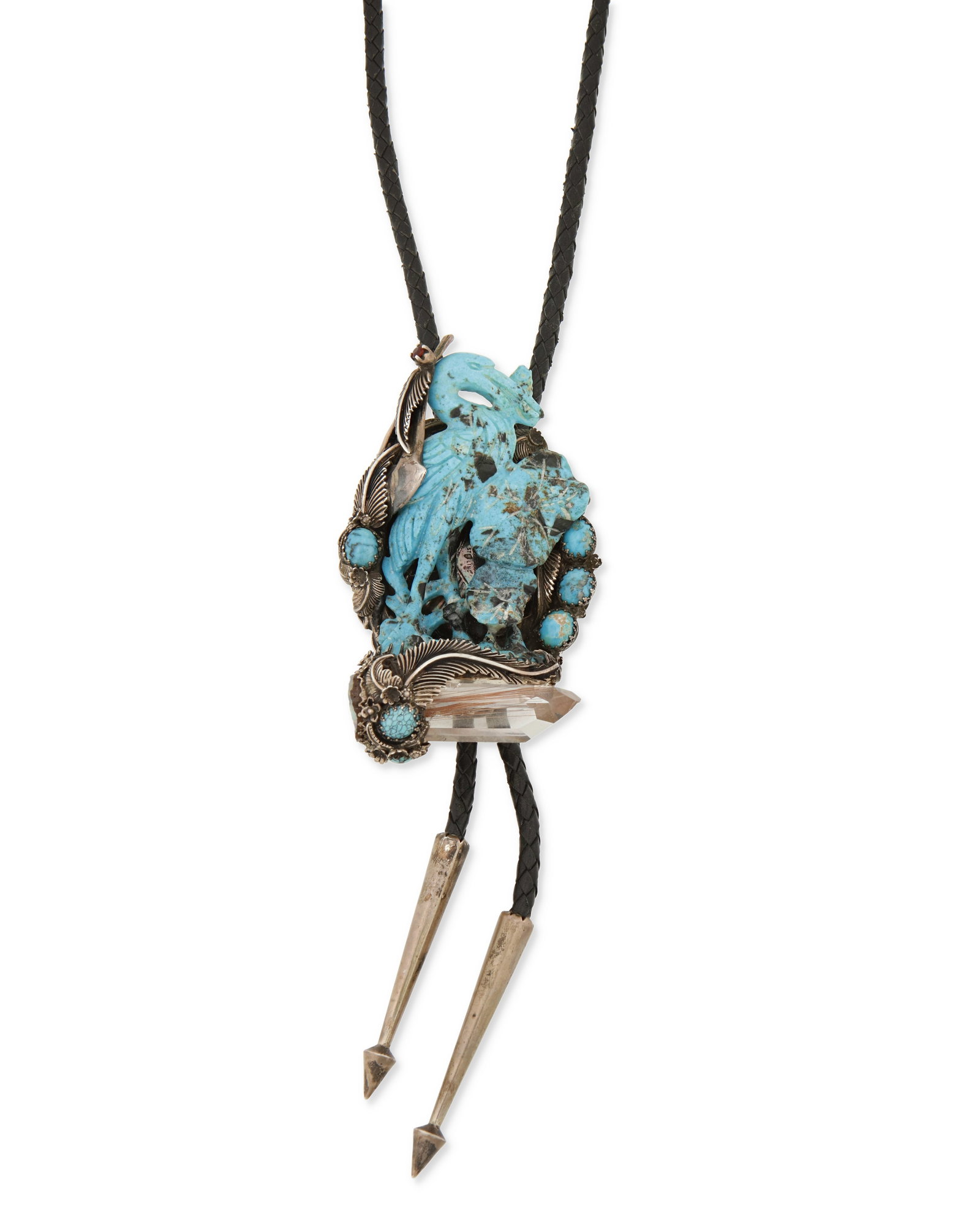 A Southwest-style turquoise and quartz bolo: A Southwest-style turquoise and quartz bolo Late 20th/21st century Appears unmarked An elaborate silver bolo with a carved turquoise crane mounted to a concho, atop a quartz crystal and set boulder op