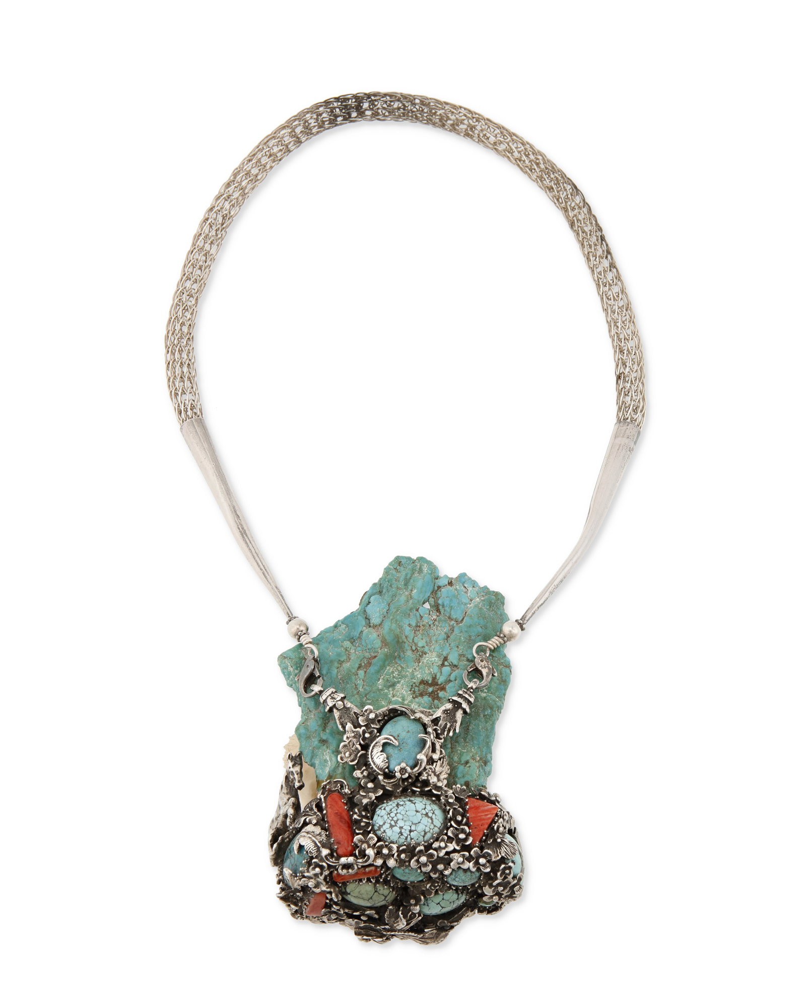 A large Southwest-style carved stone necklace: A large Southwest-style carved stone necklace 21st century Pendant roughly etched to base: 2007; chain terminals stamped: [crescent moon] R [for Relios, Inc] / (C) / 0.925 Comprising a large pendant o