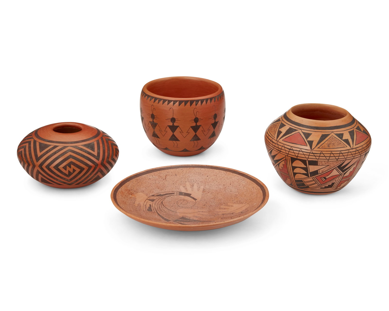 A group of Southwest pottery vessels: A group of Southwest pottery vessels Four works: Valerie Kahe (b. 1958, Hopi Pueblo) A Hopi Pueblo pottery plate, late 20th/early 21st century Signed: V. Kahe The plate with brown speckled and geometr