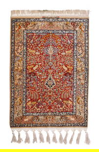 A Persian Isfahan rug: A Persian Isfahan rugMid/late 20th century; IranSigned: Mr. SanaieThe wool and silk on silk foundation rug with a polychrome Tree of Life motif on a scarlet ground5' 5" H x 3' 6" W Provenanc