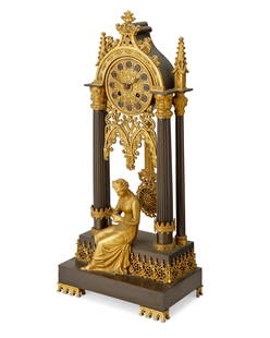 A French Gothic Revival bronze portico clock: A French Gothic Revival bronze portico clockMid-19th centuryWith a chased gilt-bronze dial, black Roman numeral hour markers, and two train movement set in a patinated and gilt-bronze Gothic-style arc