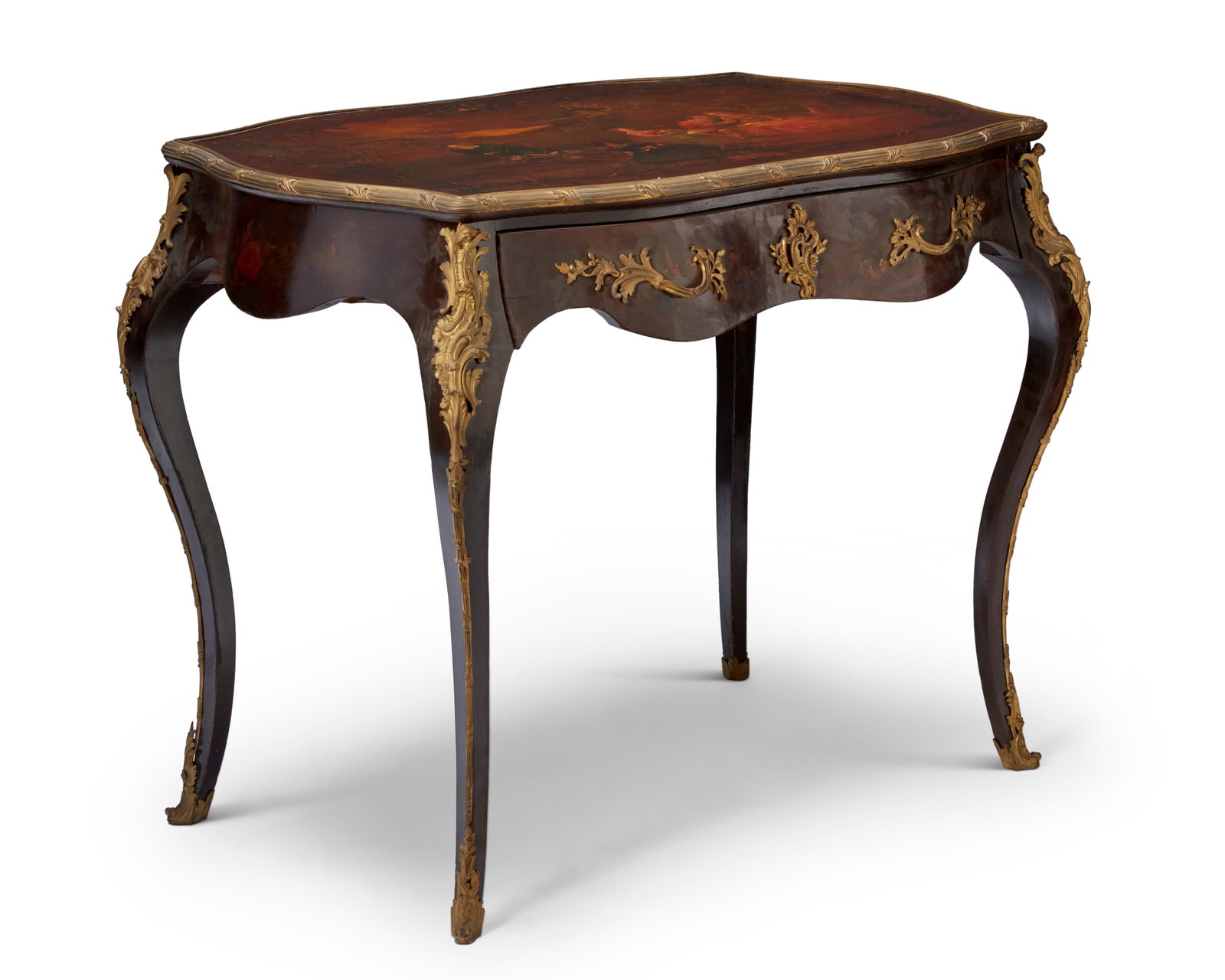 A Louis XV-style japanned desk: A Louis XV-style japanned desk Late 19th/early 20th century The lacquered wood table with a painted scene of women in a garden and featuring gilt-bronze mounts, the apron fitted with an oxbow drawer w