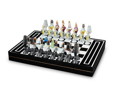 A Vista Alegre "Christians vs. Moors" chess set: A Vista Alegre "Christians vs. Moors" chess setCirca 1960-1962Each piece marked to underside: Made in Portugal / VA PortugalThe black and white Lucite board with painted porcelain game piece