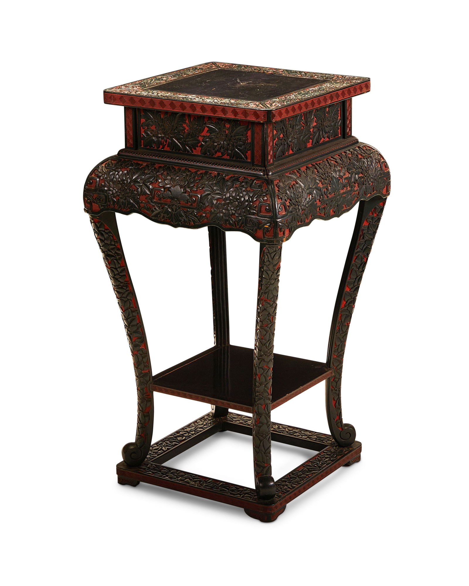 A carved black and red lacquer stand (1 of 3)